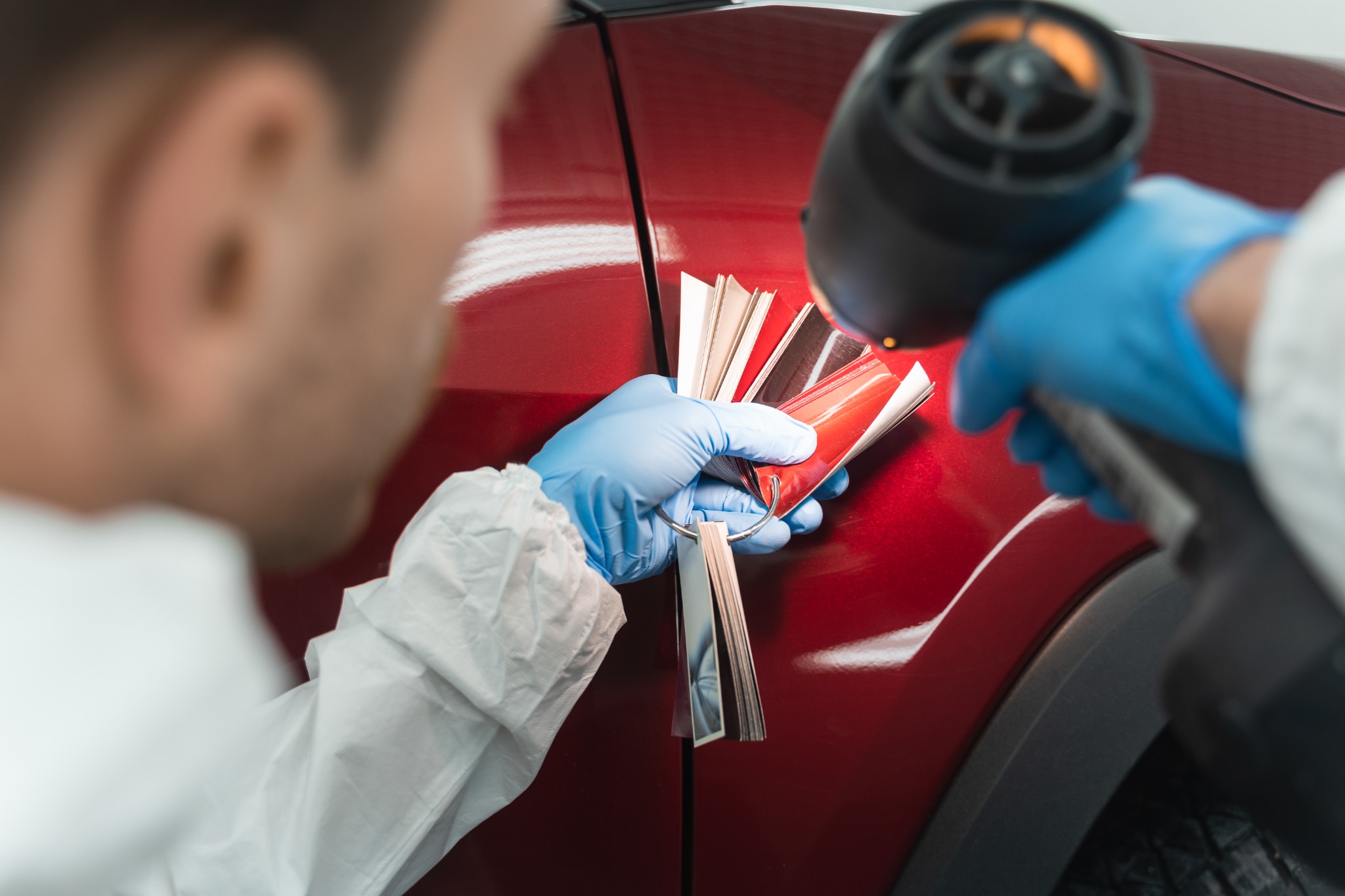 Colour matching on a red vehicle surface