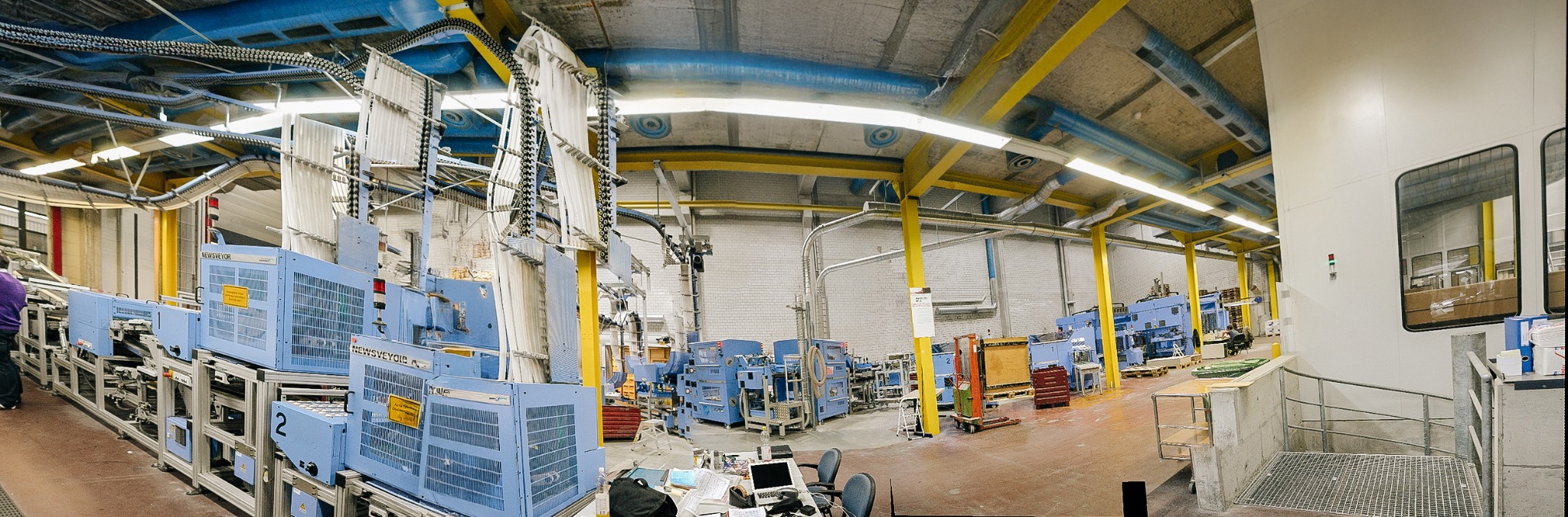 Production hall with lighting and industrial equipment